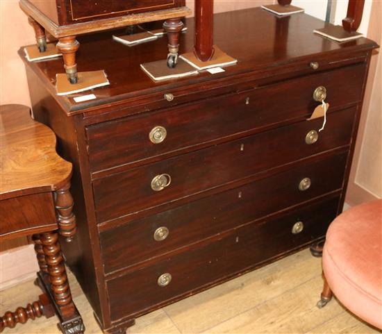 An Edwardian mahogany chest of drawers, with brushing slide, W.102cm